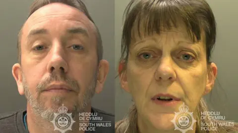 South Wales Police Headshot photograph of Tracy Turner(right) and Stuart Compton(left). Stuart has a grey beard, blue eyes and a receding hairline. Tracy has a brown fringe and blue eyes.