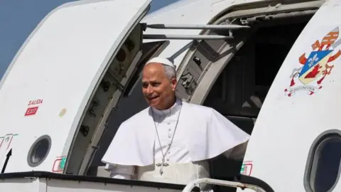 Pope Leo XIV disembarks the plane at Gando Air Base, during his apostolic journey on the island of Gran Canaria, Spain June 11, 2026