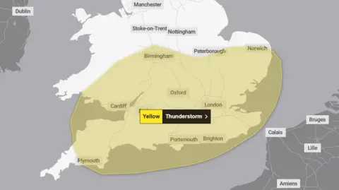 The Met Office A map of the UK showing a yellow weather warning for thunderstorm's across southern England, parts of the Midlands and south Wales.