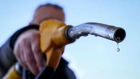 A drop of petrol falls from the nozzle of a petrol pump at a petrol station in Vélizy-Villacoublay, near Paris, on March 9, 2026.