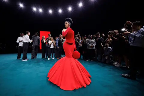 Justin Shin/WireImage via Getty Images Cardi B attends the Robert Wun Haute Couture Fall/Winter 2026/2027 show as part of Paris Fashion Week on July 08, 2026 in Paris, France. 
