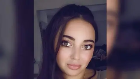 A selfie-style picture of Zoe Panayi looking straight at the camera