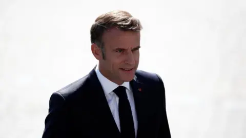 Reuters French President Emmanuel Macron. Seen from slightly above and looking off camera