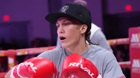 Boxer Hannah Rapp warming up in the ring before a fight