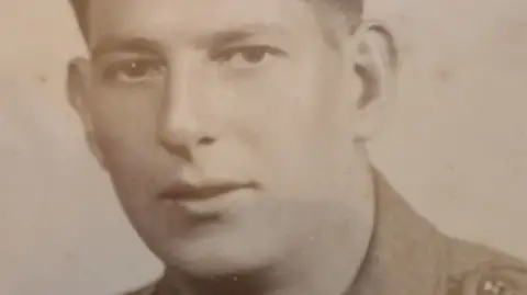 BBC A black and white portrait photograph of Pte Henry Moon