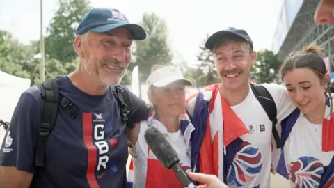 The family of Becky Wilde giving an interview. They are all wearing TeamGB t-shirts