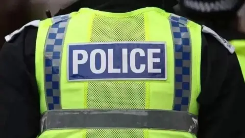 GETTY IMAGES A police officer in hi vis