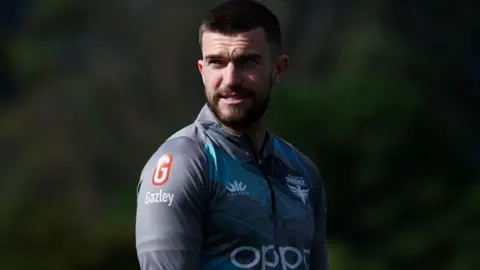 Getty Images New Zealand's Tim Payne on the pitch.