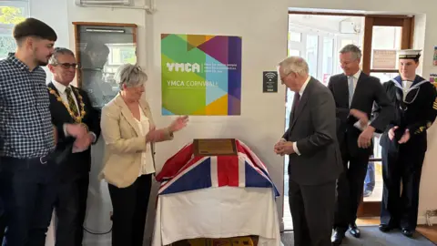 A plaque is unveiled by The Duke of Gloucester
