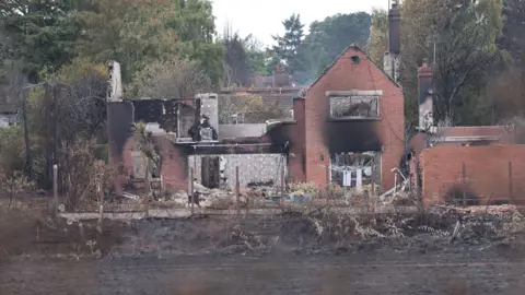 BBC A burnt house in Stourbridge.