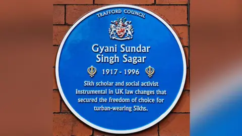 Trafford Council handout Close up of the blue plaque issued by Trafford Council for Sikh activist Gyani Sundar Singh Sagar.