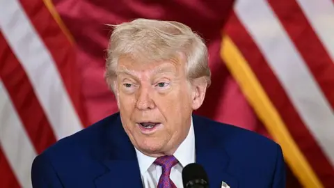 US President Donald Trump attends a breakfast with business leaders in Doha on May 15, 2025. (Photo by Brendan SMIALOWSKI / AFP) (Photo by BRENDAN SMIALOWSKI/AFP via Getty Images)