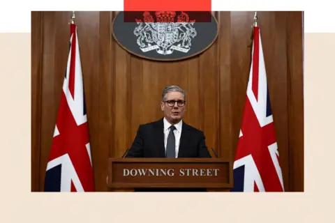 PA Media Starmer at a Downing Street podium giving a speech 