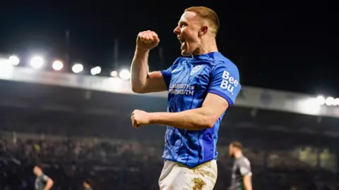 Portsmouth forward Colby Bishop celebrates during the Championship match between Portsmouth and Cardiff City at Fratton Park