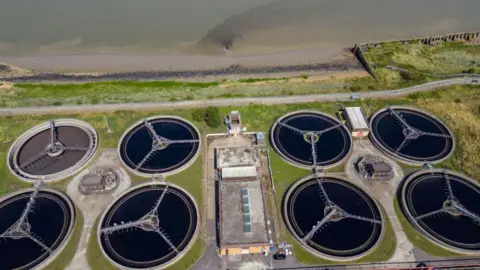 An aerial view of sewage being processed at a Thames Water Sewage Treatment Works