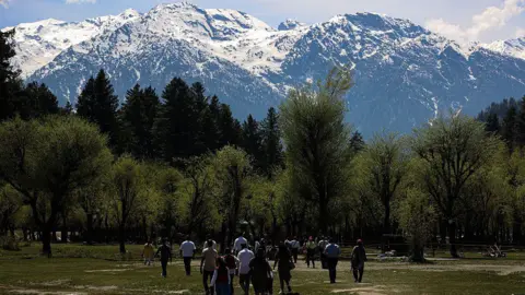 Tourists visit Betaab Valley in Pahalgam, Jammu and Kashmir, on April 22, 2026. 