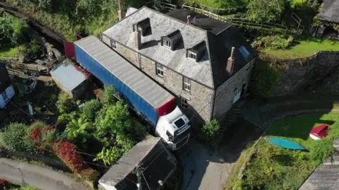 A lorry stuck in the narrow lane in Forder near Saltash