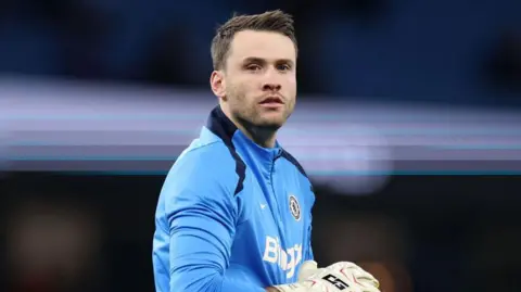 Marcus Bettinelli looking on 