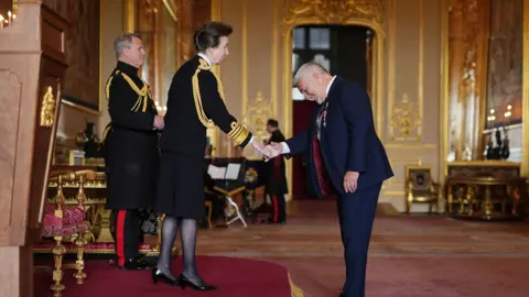 PA Media Paul Hollywood with Princess Anne