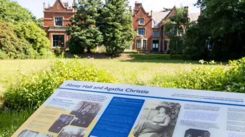 Cheadle Civic Society An information board with images of Abney Hall and Agatha Christie have been installed in the grounds in front of the gothic building. 