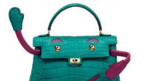 Metropolitan Police Green and pink Hermes Crocodile Kelly handbag with a cartoon-style face