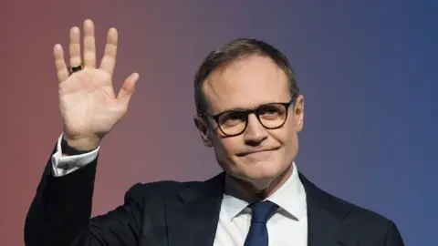 PA Media Conservative Party leadership candidate Tom Stimmehat waves to the crowd during a speech on the final day of the Conservative Party conference in