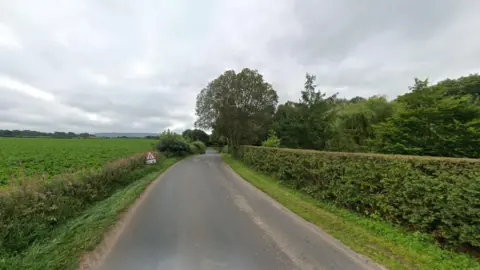 A general view of the C1026 road between Heads Nook and Faugh