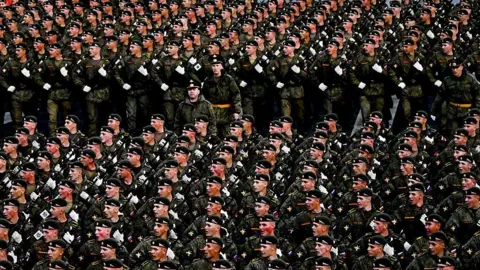 Troops march towards the Red Square to attend the rehearsal of Victory Day military parade marking the 80th anniversary of the victory over Nazi Germany in World War II, at Red Square in Moscow, Russia on May 3, 2025