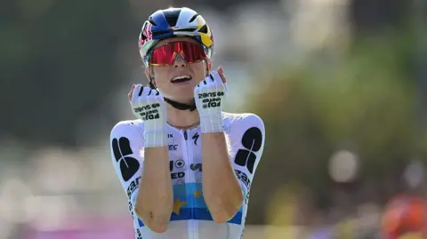 Demi Vollering celebrates as she wins stage eight of the 2026 Tour de France Femmes in Nice