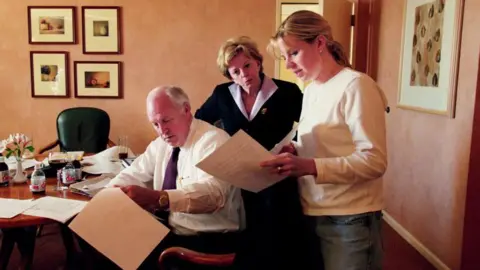 Getty Images Dick Cheney with his wife Lynne and his youngest daughter Mary