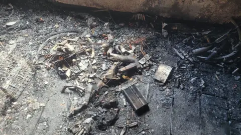 DWFRS Image of the aftermath of an e-bike fire at a house in Swindon