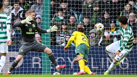 Felix Passlack scores for Hibernian against Celtic