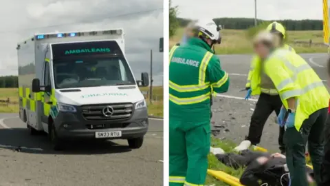 Ambulance drives on road with emergency lights on. Paramedics attend a man lying in a stretcher on the side of a road.