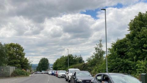 Cars queuing up at the Bowling Back Lane Household Waste Recycling Centre
