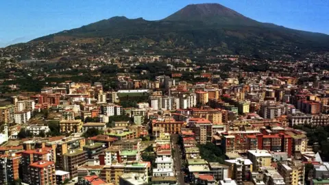 Getty Images The Italian city of Naples with the Mount Vesuvius in the background. Photo: October 2022