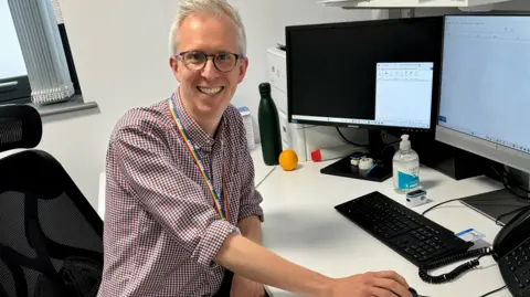 The other Dr. Tom Gorman at his desk