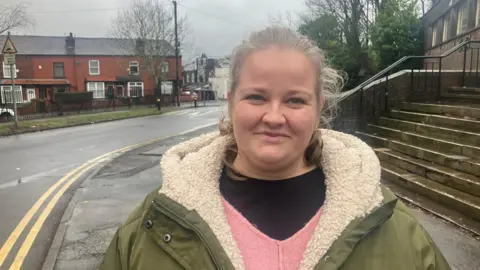 Photograph of Tasha Southern from Darcy Lever in Bolton. She is pictured on a road in the Breightmet area of the town. 