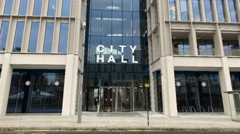 Sunderland City Hall, which is a modern building with large windows at the front.