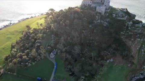 Henry Mathews/PA Media Storm damage in St Michael's Mount near Cornwall.