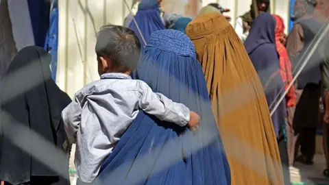 File image of Afghan migrants who have crossed into Pakistan