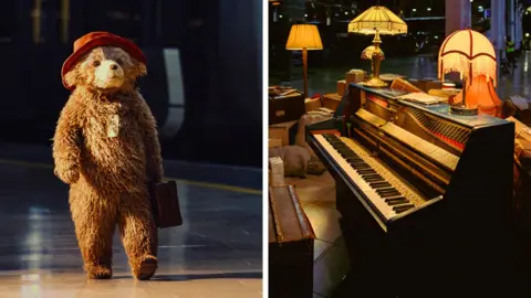 IshaShah/Universal Two promotional images from the music video show, on the left, Paddington Bear standing on the platform at London Paddington Station and, on the right, the piano as part of the set on the platform, surrounded by lamps and parcels.