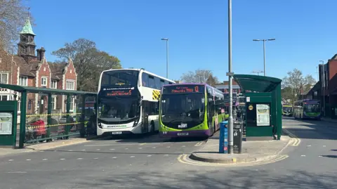 Alice Cunningham/BBC A general view of Ipswich bus station. Two buses are parked in part of the station.
