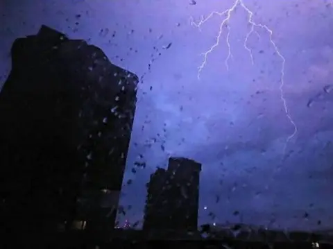 Leigh / Weather Watchers Lightning lights up the night sky in Chelsea, Greater London