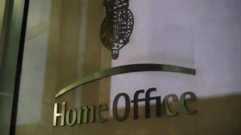 A general view of the Home Office sign outside the office building in Westminster. 