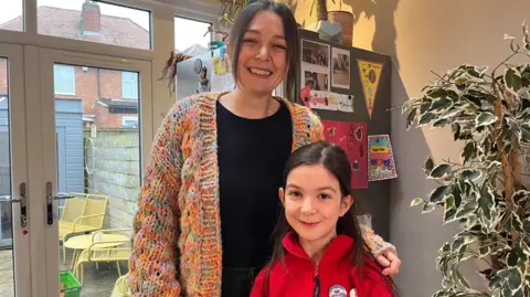 BBC Eight-year-old Fern and her mother Lucy 