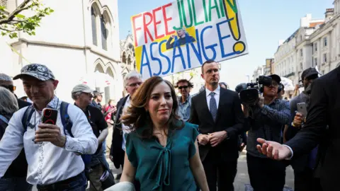 Reuters Stella Assange, wife of the WikiLeaks founder Julian Assange, walks outside of the High Court, after the ruling