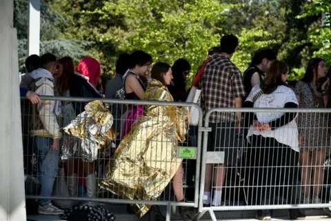 Getty Images Fans queue to see Taylor Swift in Paris