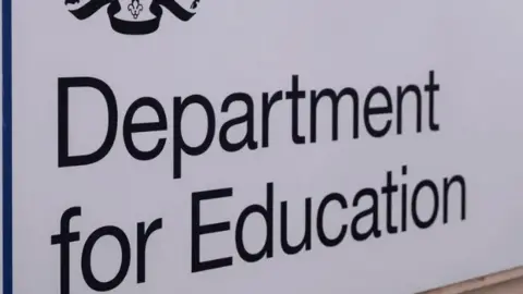 Getty Images A sign saying "Department for Education