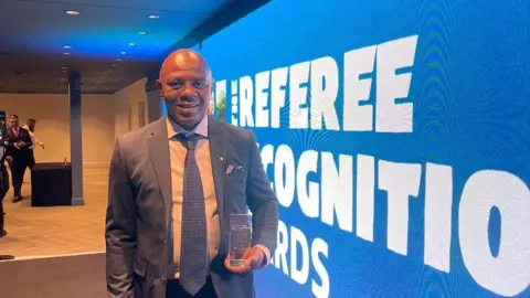 Ian Moore Ian Moore with his award