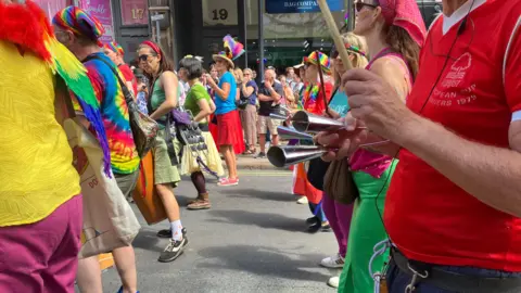 People playing music during the Notts Pride march in Nottingham city centre on 25 July.